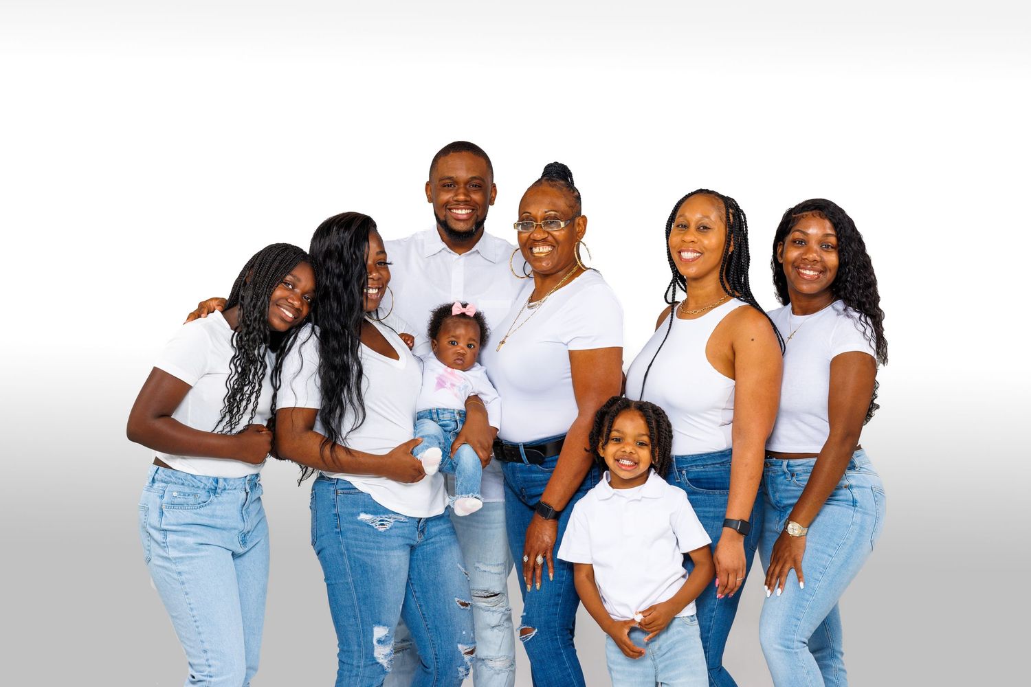 Family Portrait with White background wearing Jeans