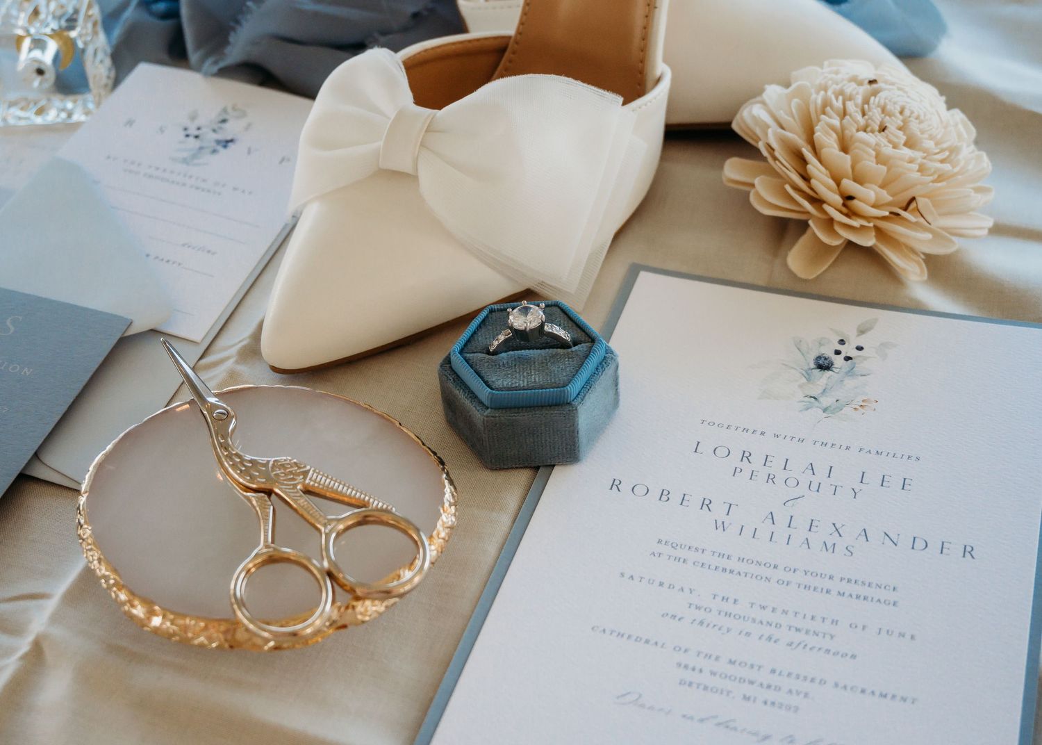 Blue and Cream Wedding Flat Lay Created By Cheyenne Michelle Photography, LLC