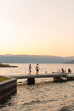 couple enjoying the summer evening on Okanagan Lake