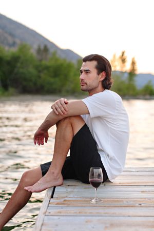 man sitting with wine
