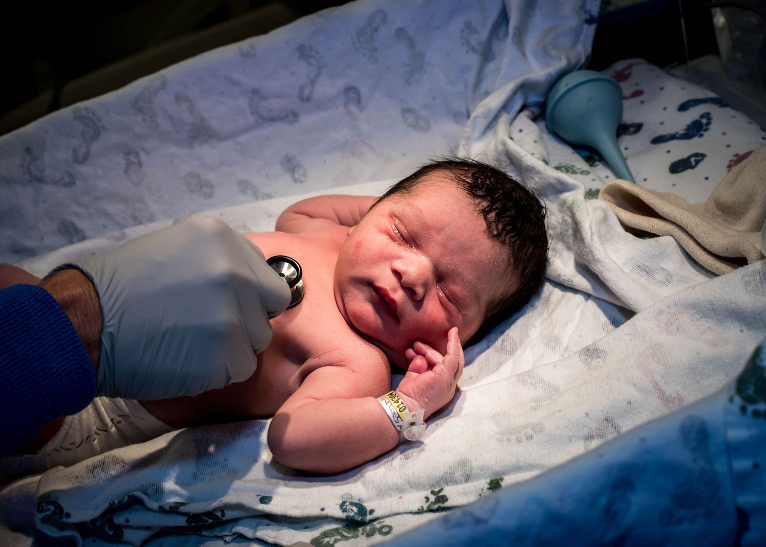 Nurse examining a newborn just after birth at UnityPoint Health in Sioux City, IA.