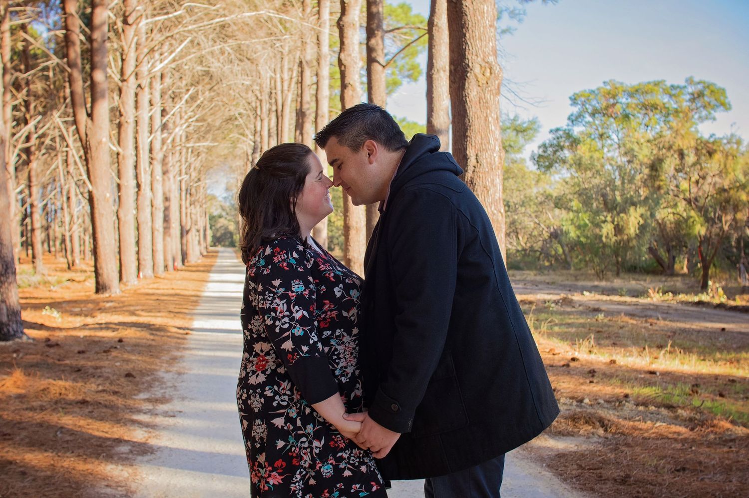 couple facing each other noses touching