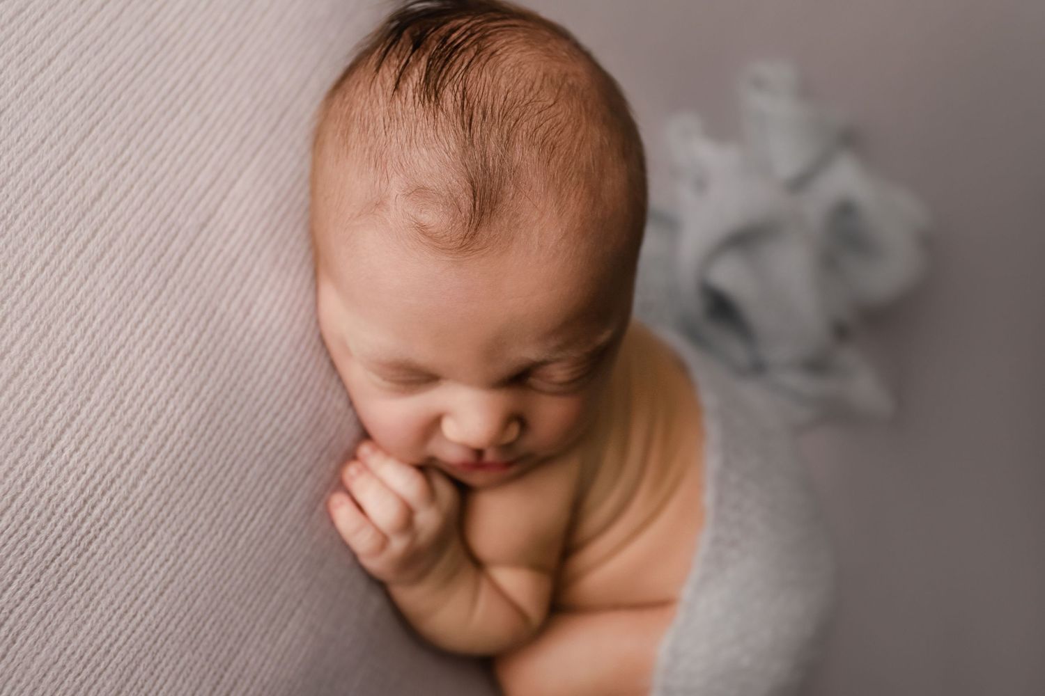 fine art newborn portrait of baby boy details in blue