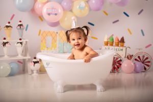 1 year old baby girl birthday photoshoot; Ice Cream Cake Smash session; baby birthday at Lexington, SC portrait studio