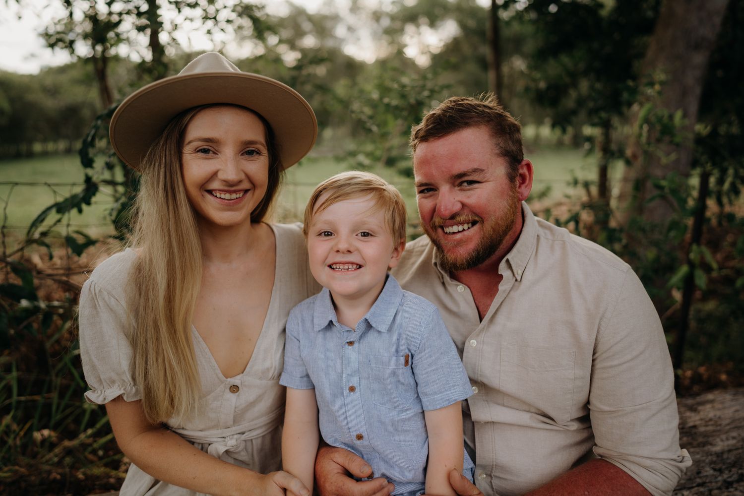 family of three have family photos in Sydney forest disability family session