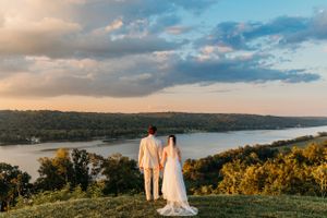 Wedding portrait of a couple at Soli Tree Farms in Kentucky overlooking the Ohio river.