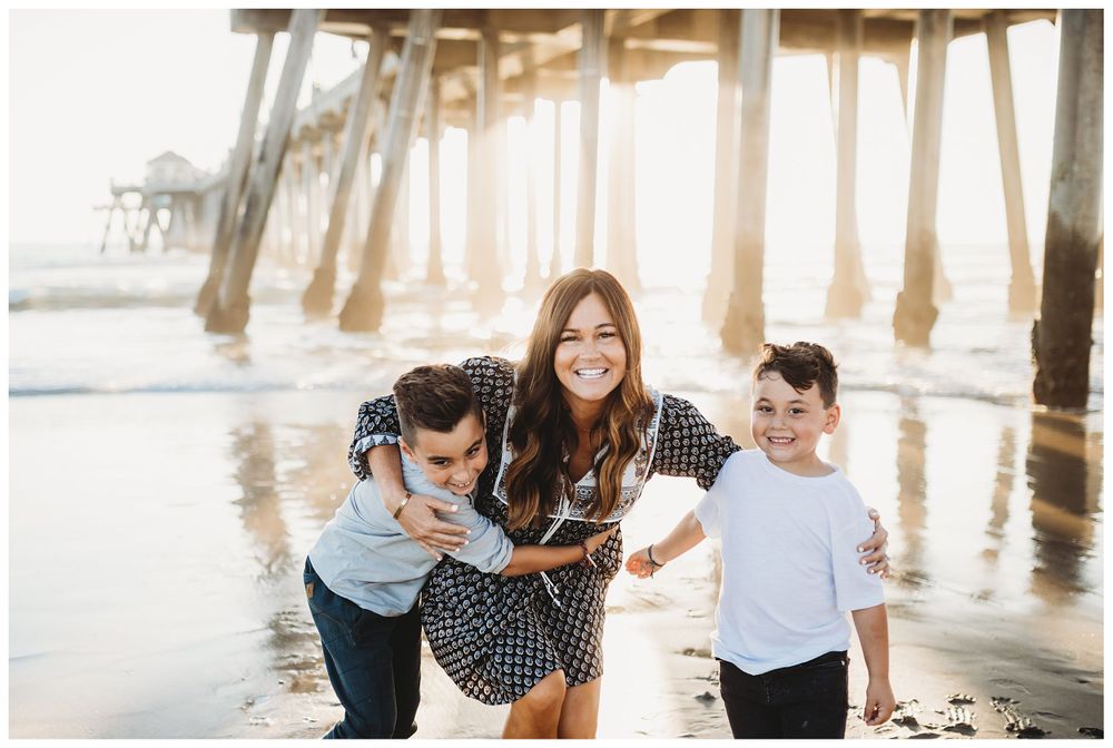 mom hugging sons
