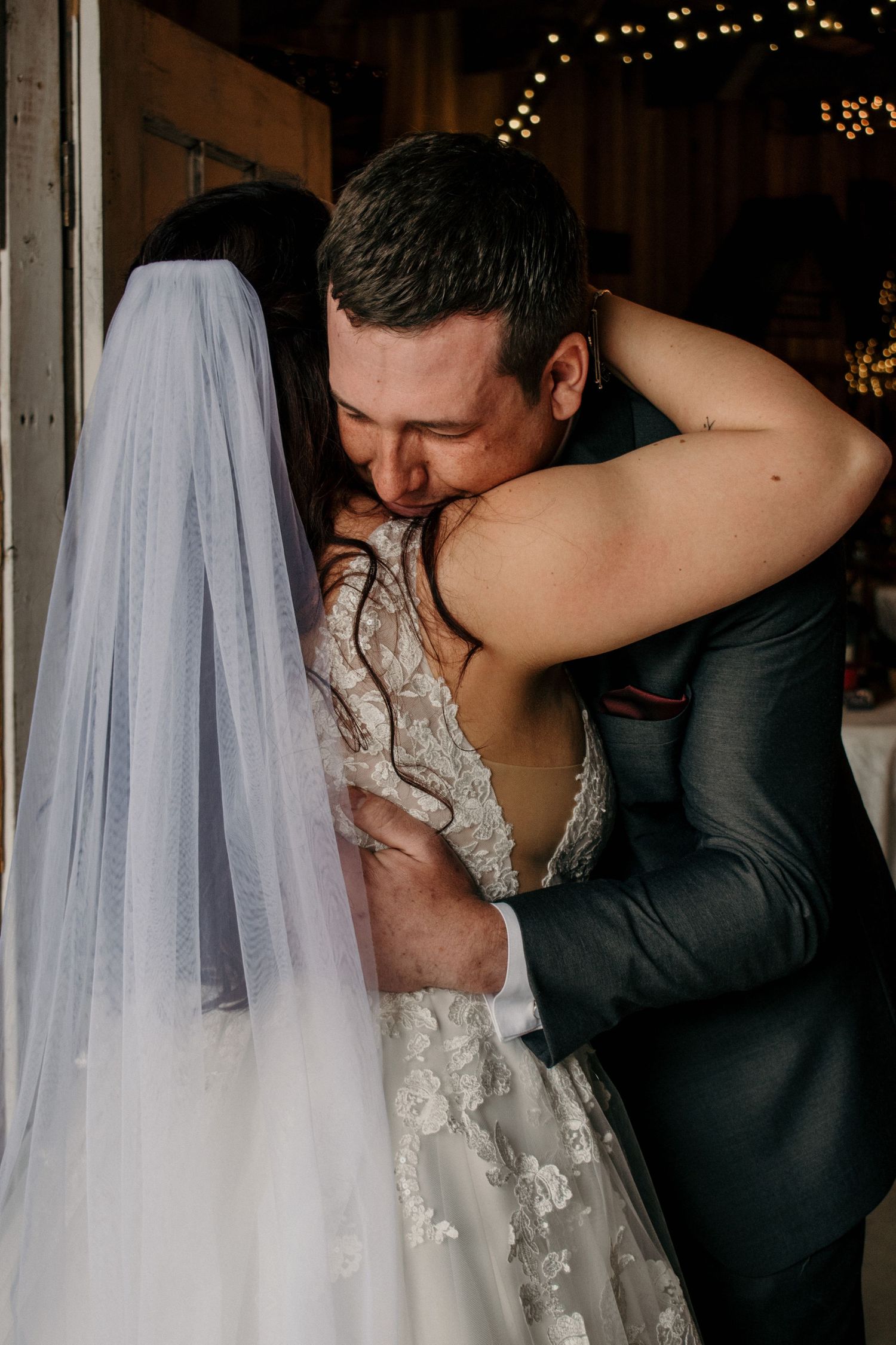 Bride and Groom emotional hug during first look