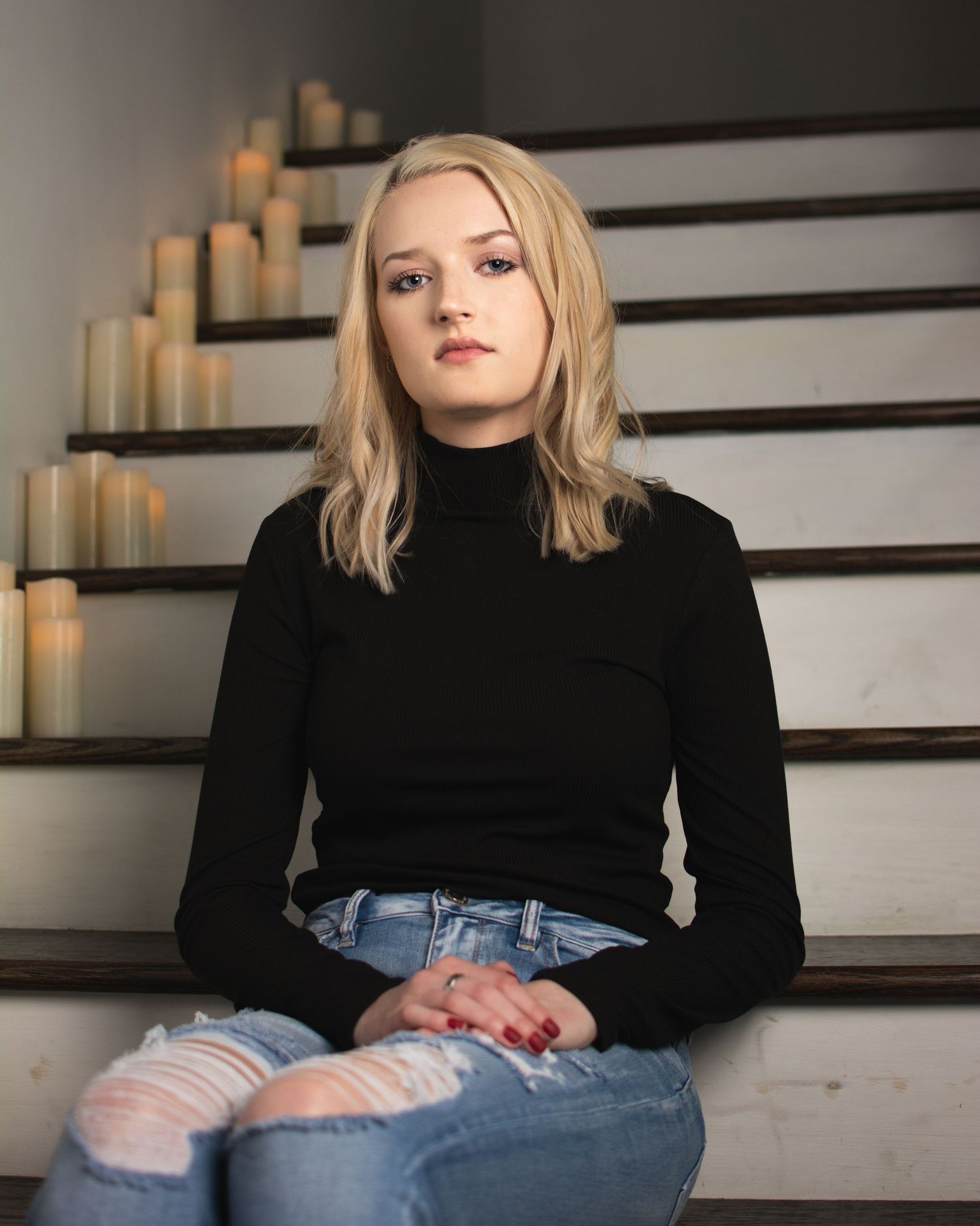 Dramatic portrait of woman on stairs