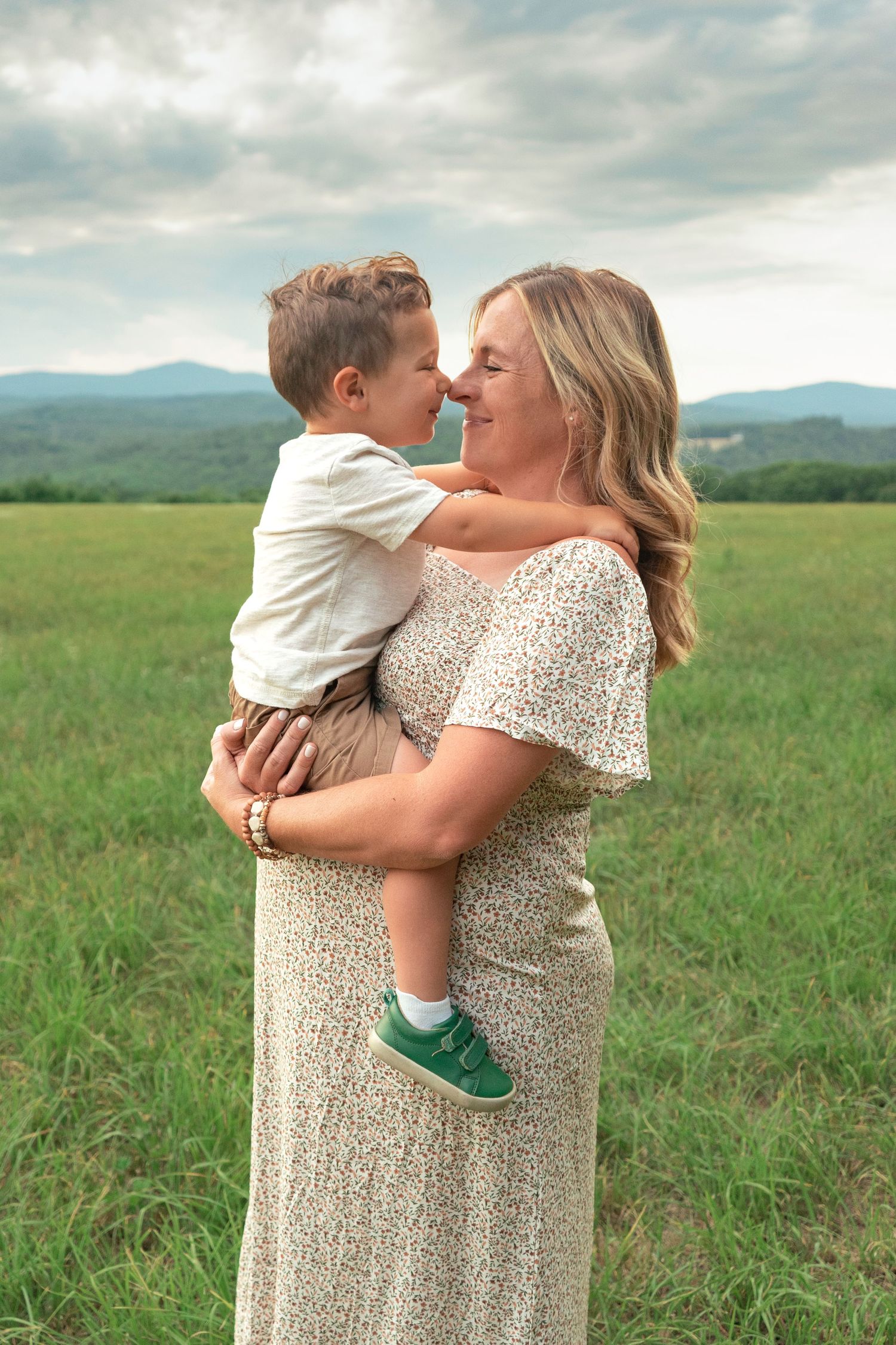 woman holding son in new hampshire