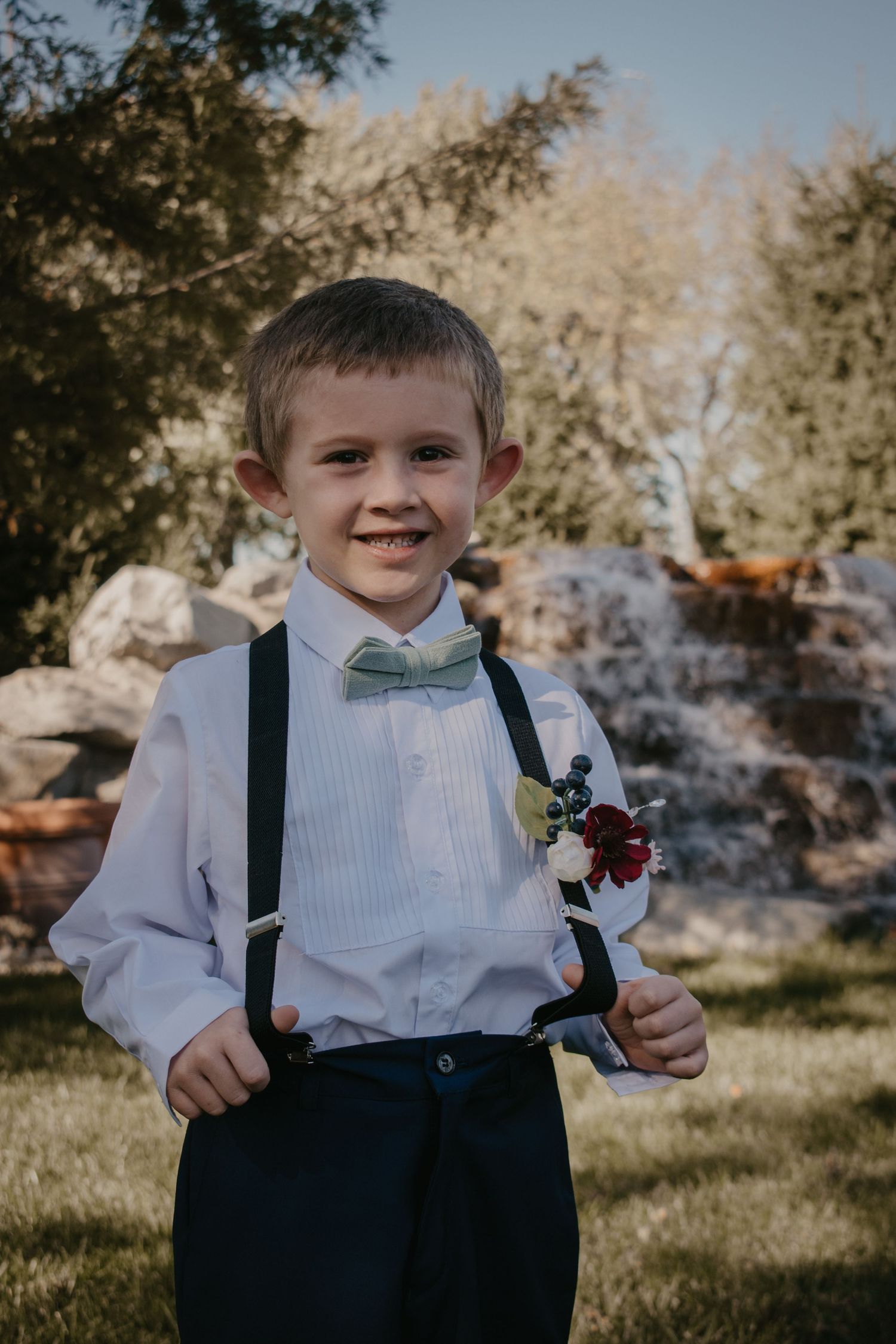 ring bearer posing for the camera