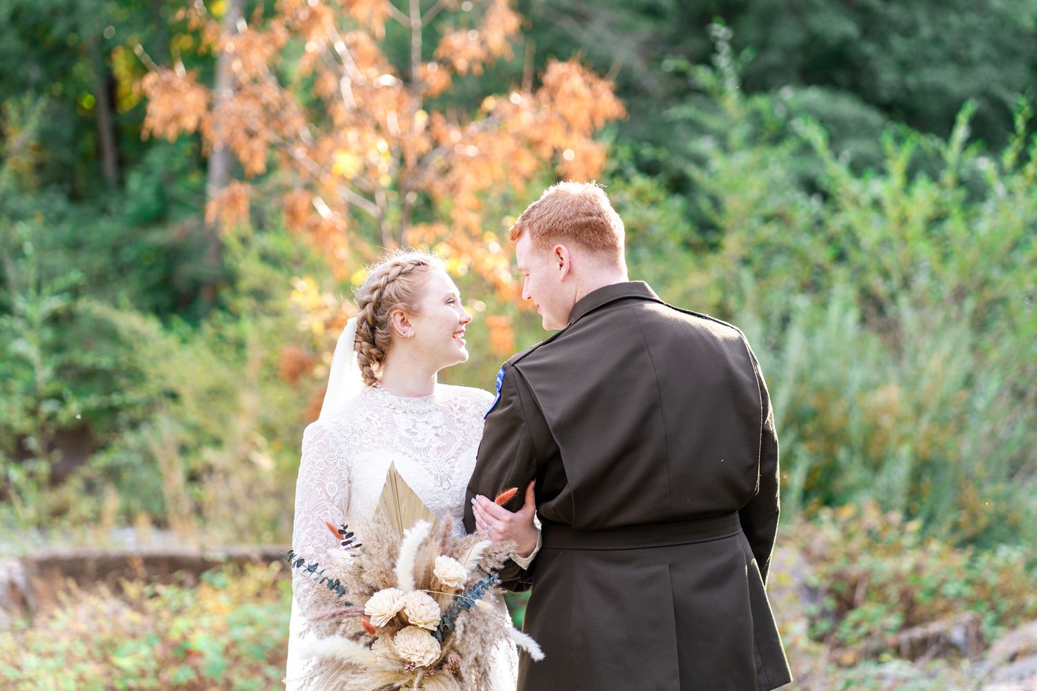 bride smiles at groom