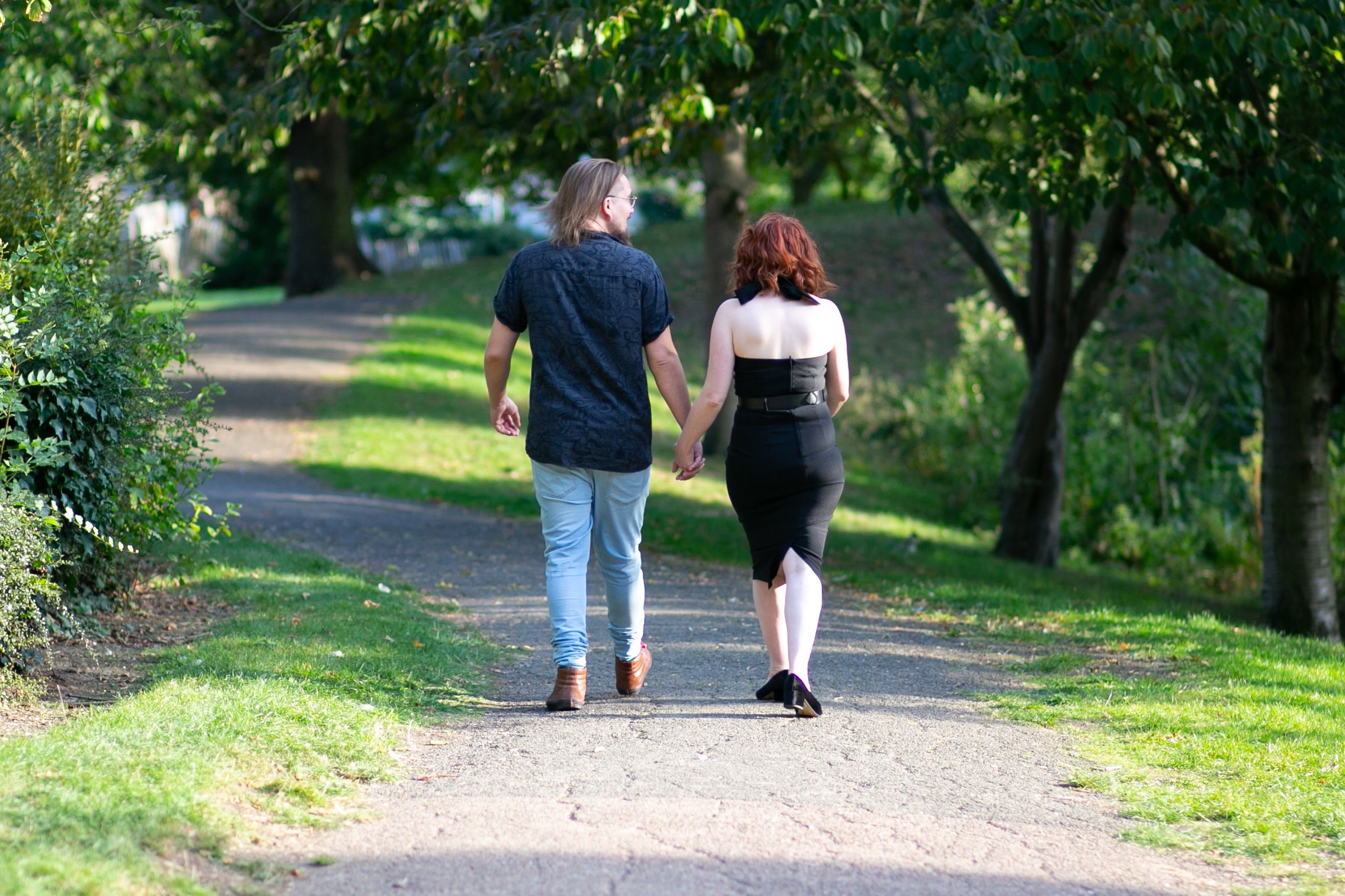engaged couple walking at pre wedding engagement photoshoot