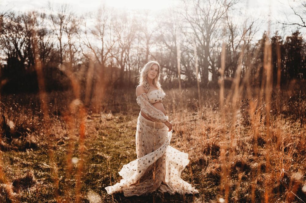 Artistic maternity photography sequence showing movement of a white dress in a rustic outdoor setting.