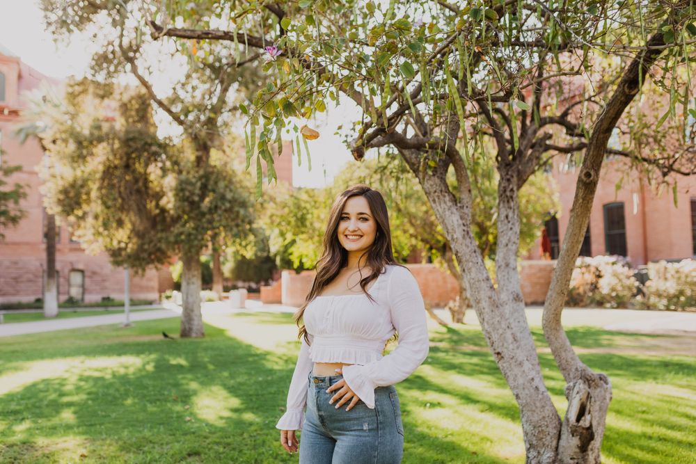Outdoor portrait series showing someone in white and denim posing near trees on a sunny day.