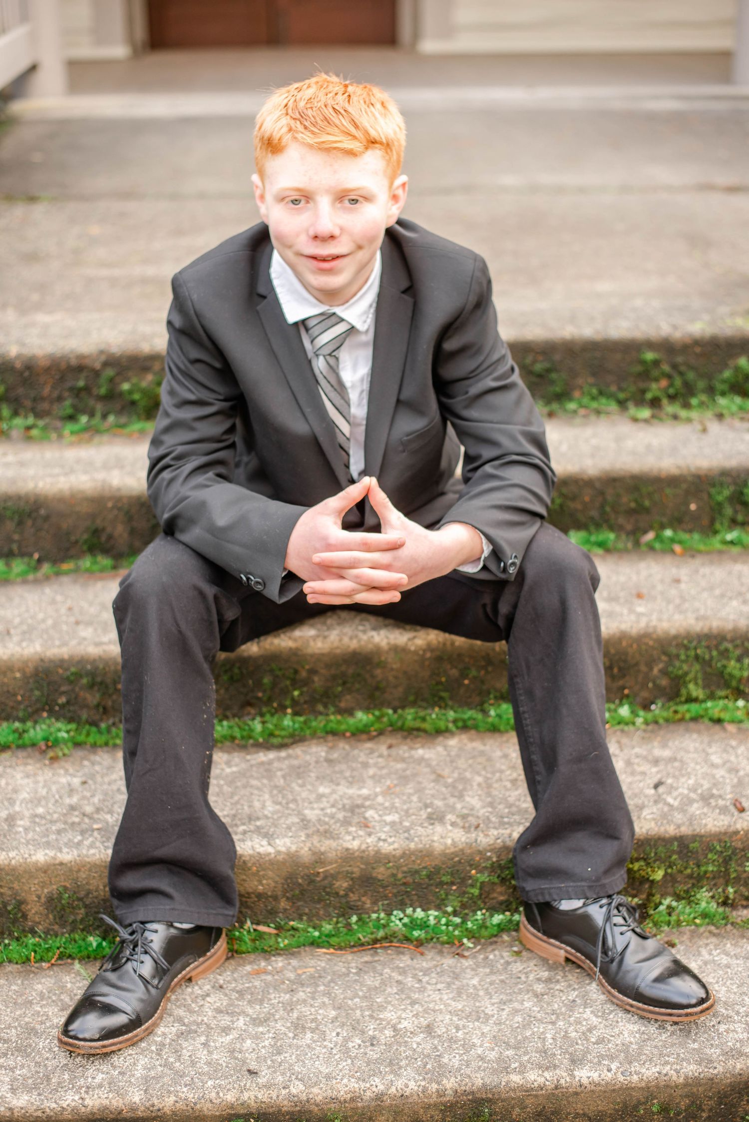 Detail shots focusing on formal attire and posed positions on concrete steps.