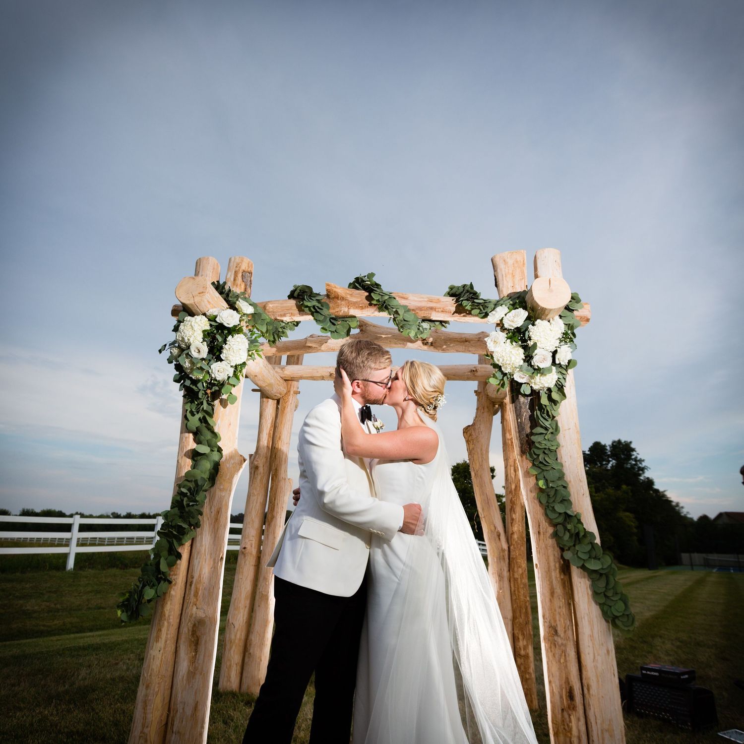 Outdoor ceremony in Zionsville with custom made trellis