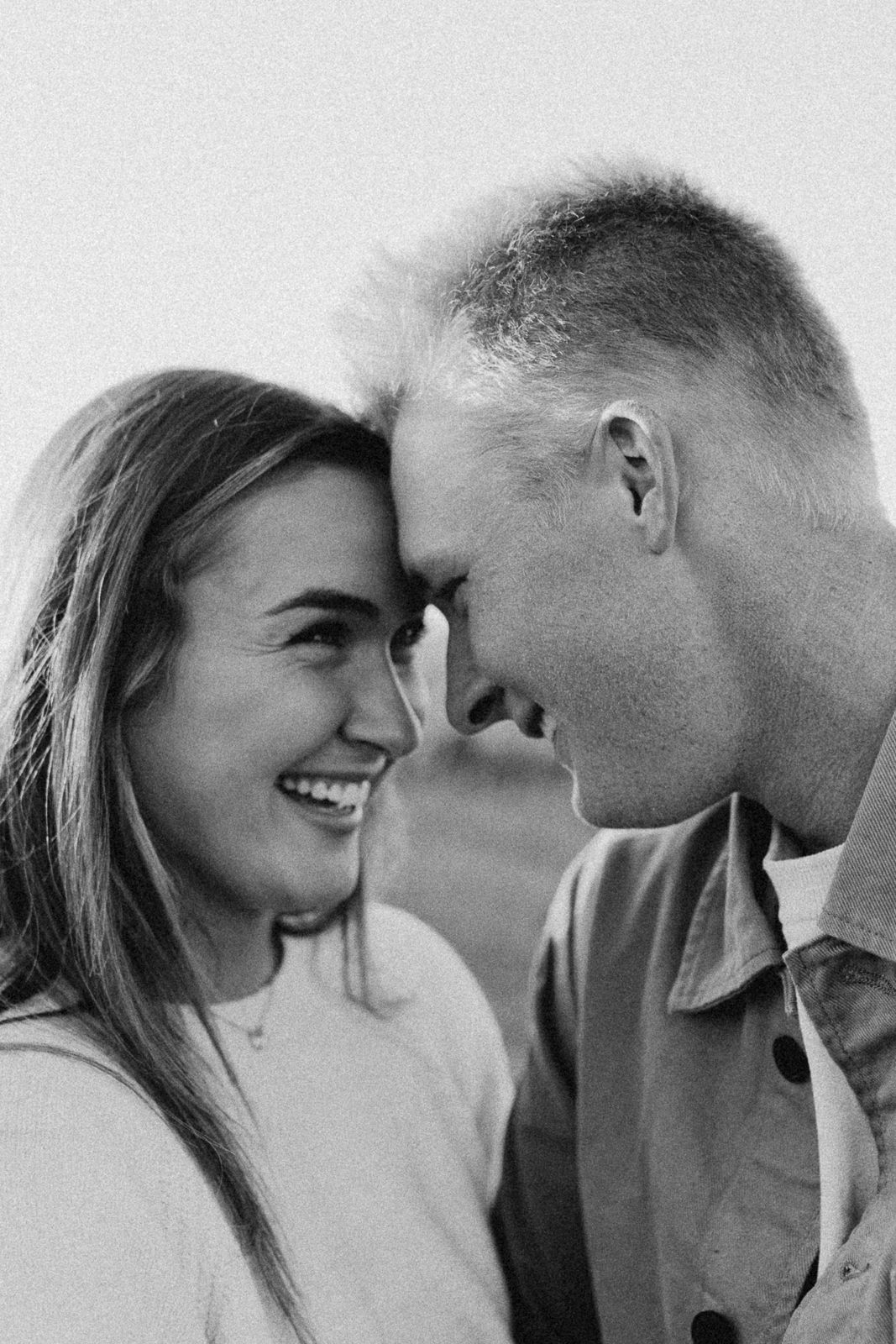 Black and white photo series showing intimate romantic moments between a couple.