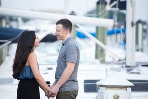 Downtown Annapolis Couple against Sailboat Backdrop | Engagement Photography | Date Night Sessions | DANIE Photography