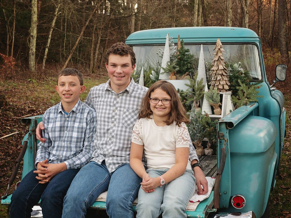 family photos with blue truck