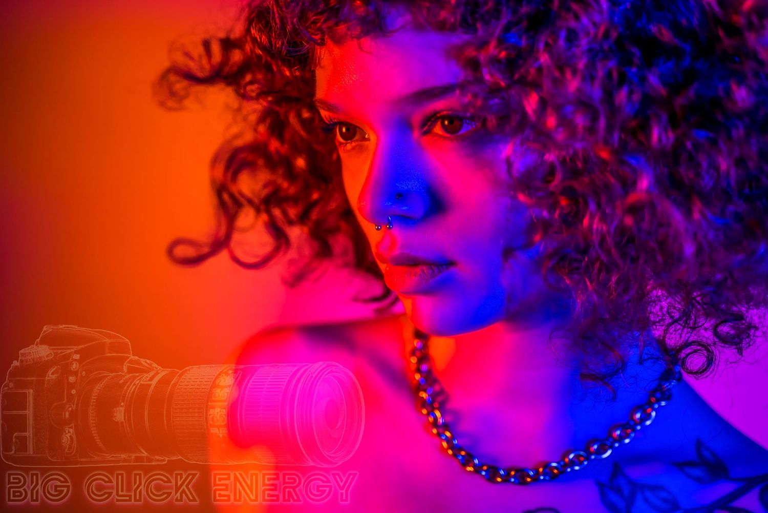 Beautiful black model with curly, dark, natural hair. Shot under glowing neon light. Tattoos, piercings, sexy, cute.