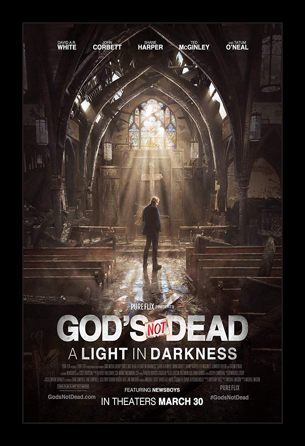 Movie poster featuring gothic church interior with dramatic rays of light streaming through windows.