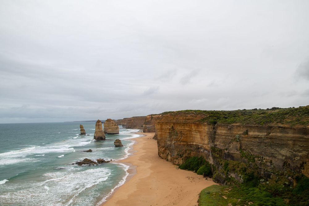 Dramatic coastal landscape of the Twelve Apostles rock formations along the Great Ocean Road.