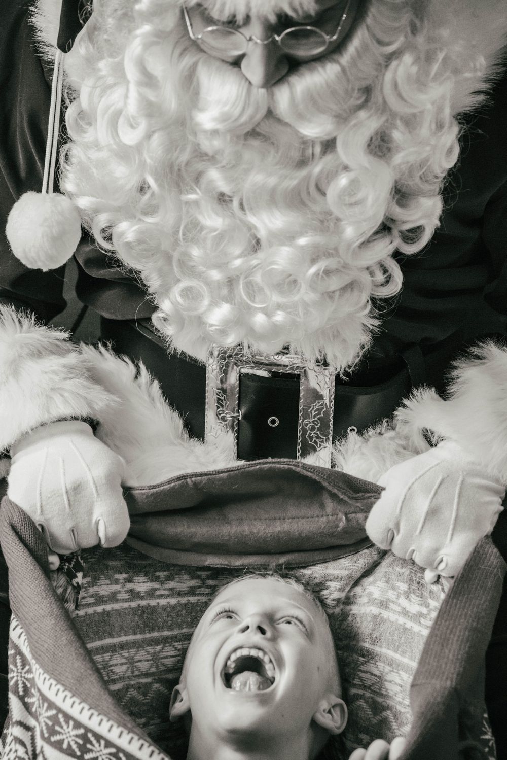 Santa with Child in his toy bag, Shiny Penny Studios, Cleveland