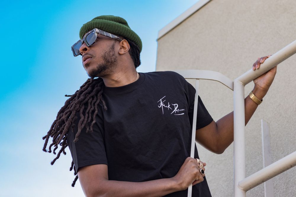 Male model posing for clothing brand shoot.