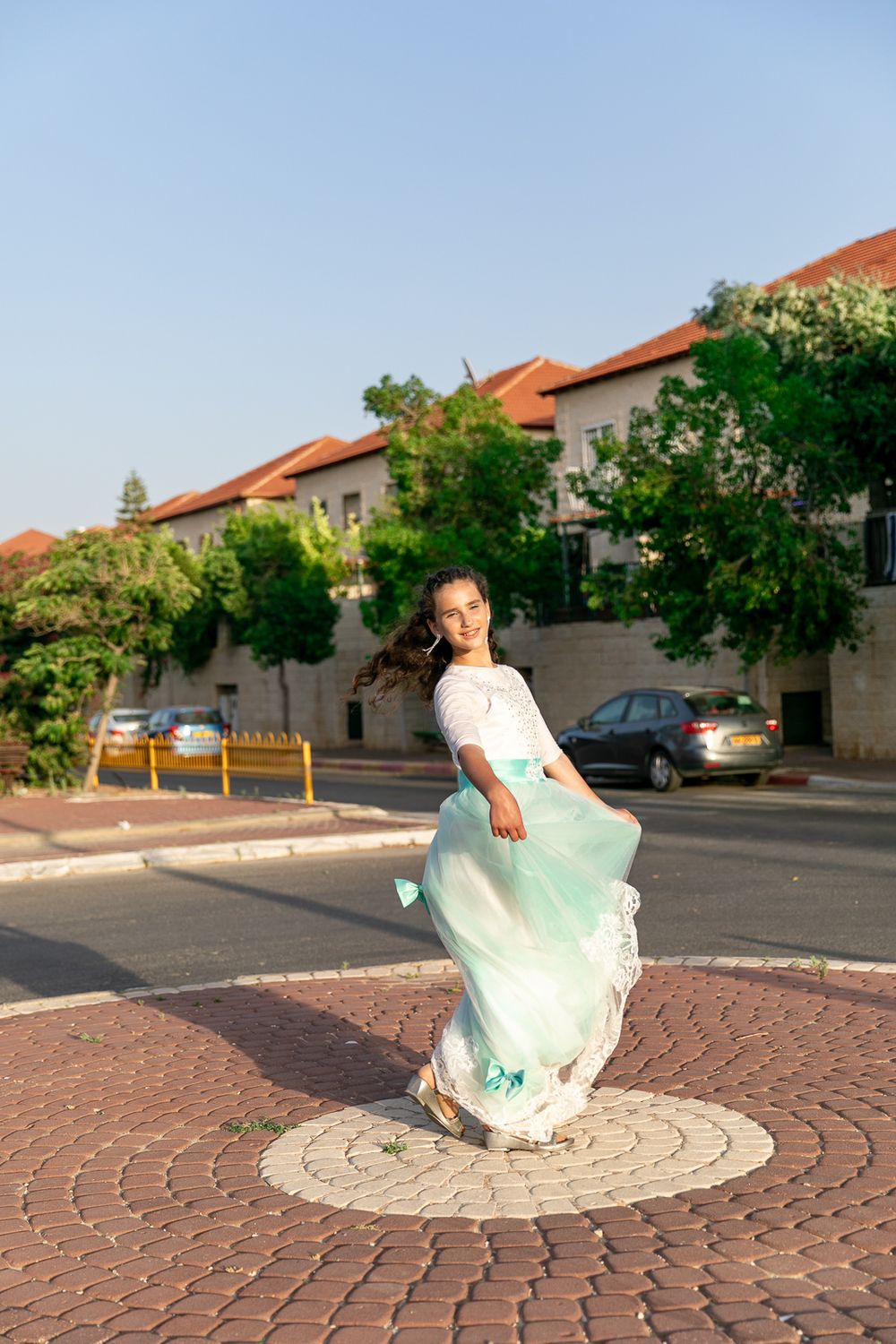 A girl standing in the middle of a circle