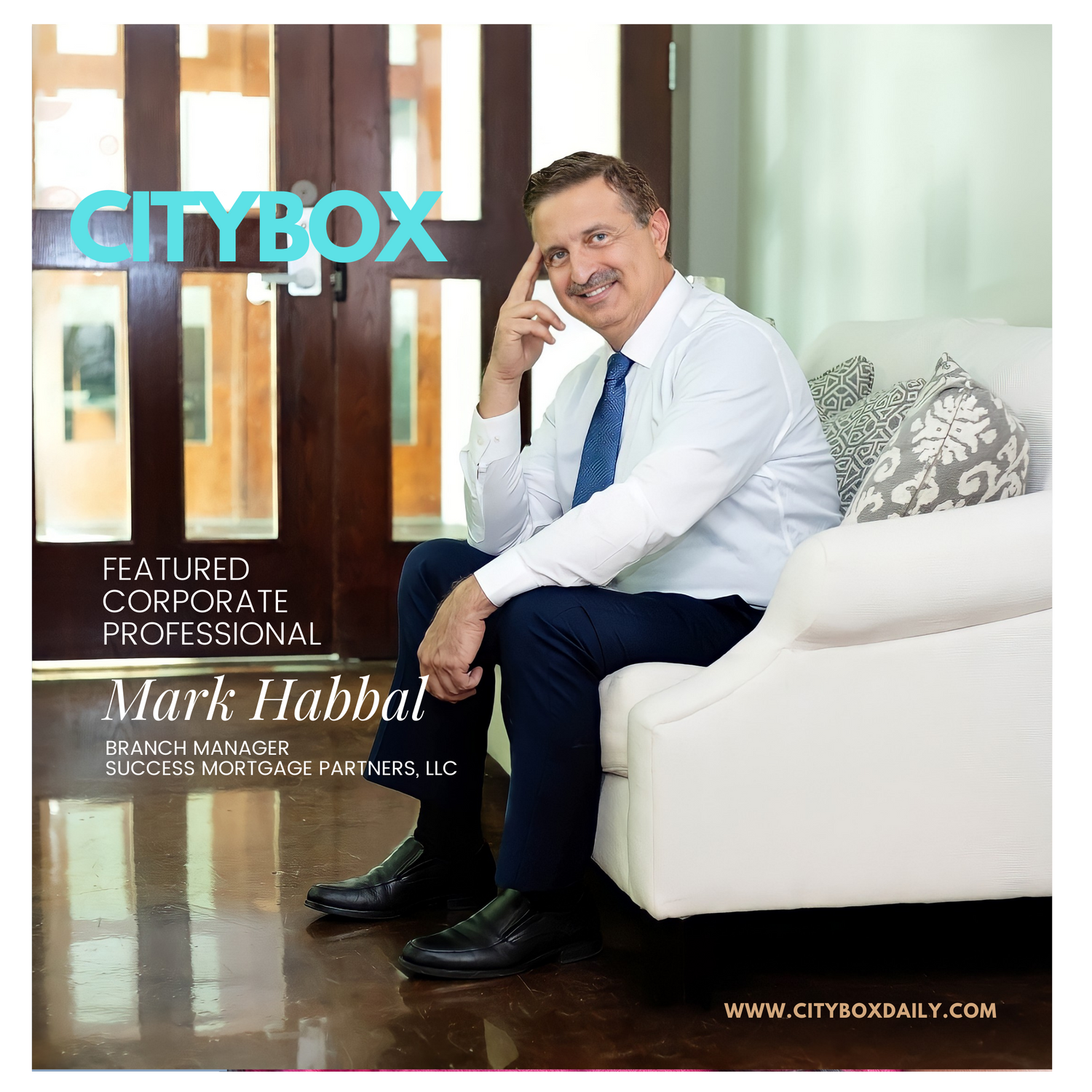 business man sitting on the white couch in the office  white shirt mustaches flor reflection