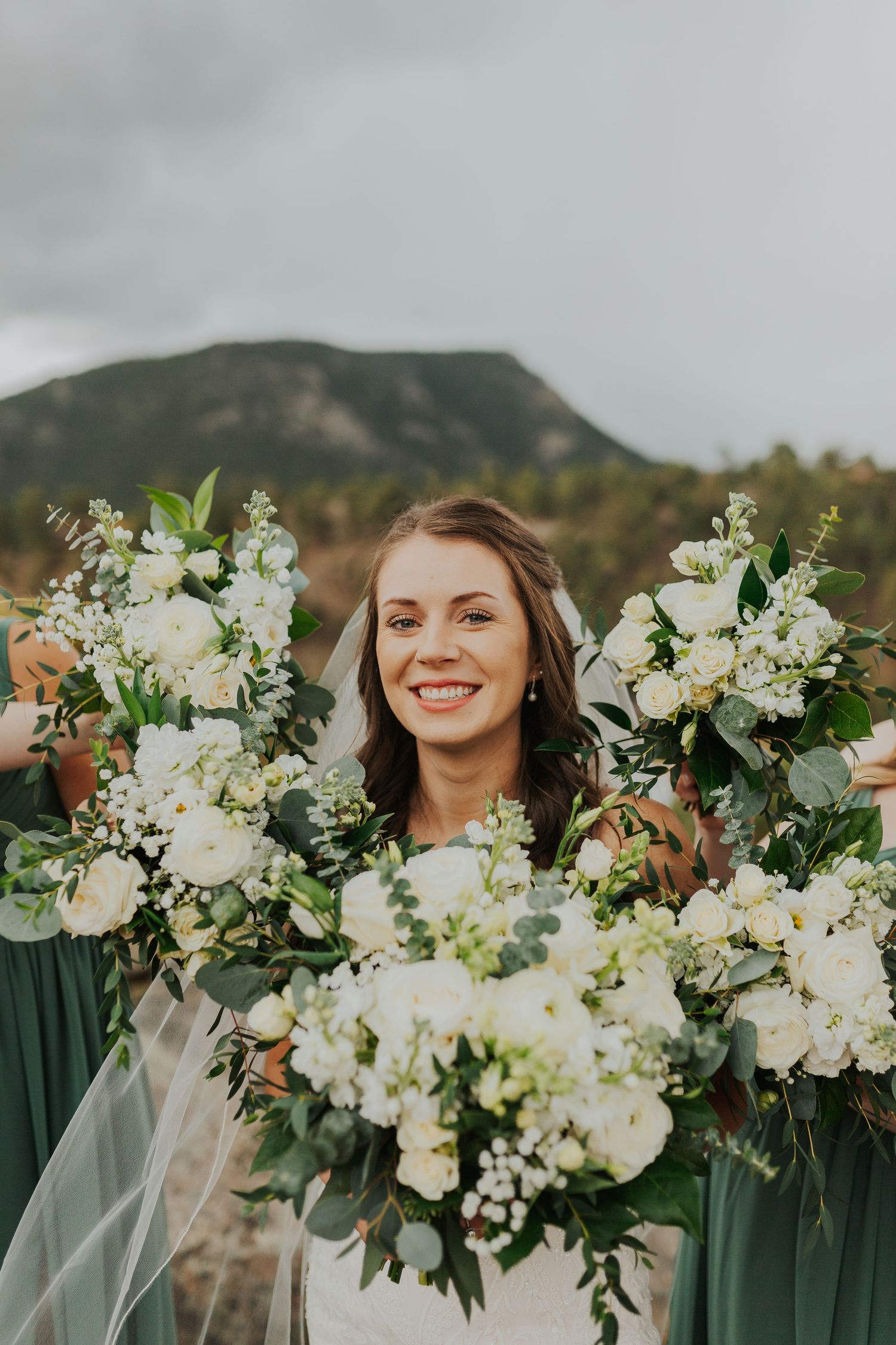 Bouquet frame around the bride Estes Park, CO