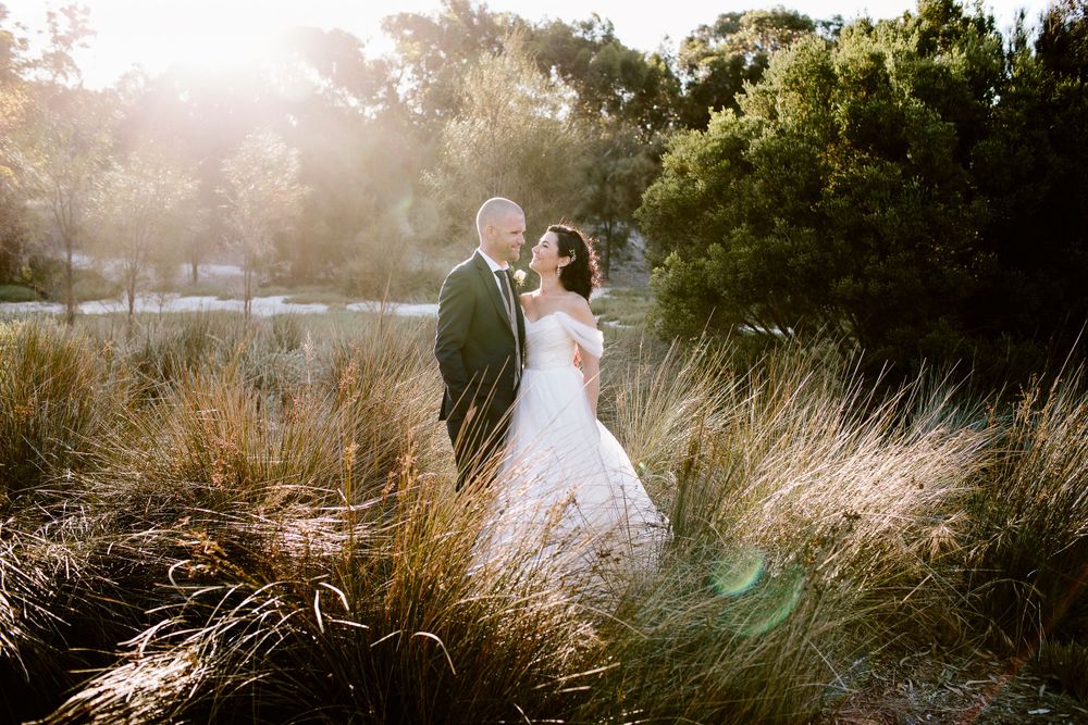 Bride and groom looking at eachother at their Fremantle wedding