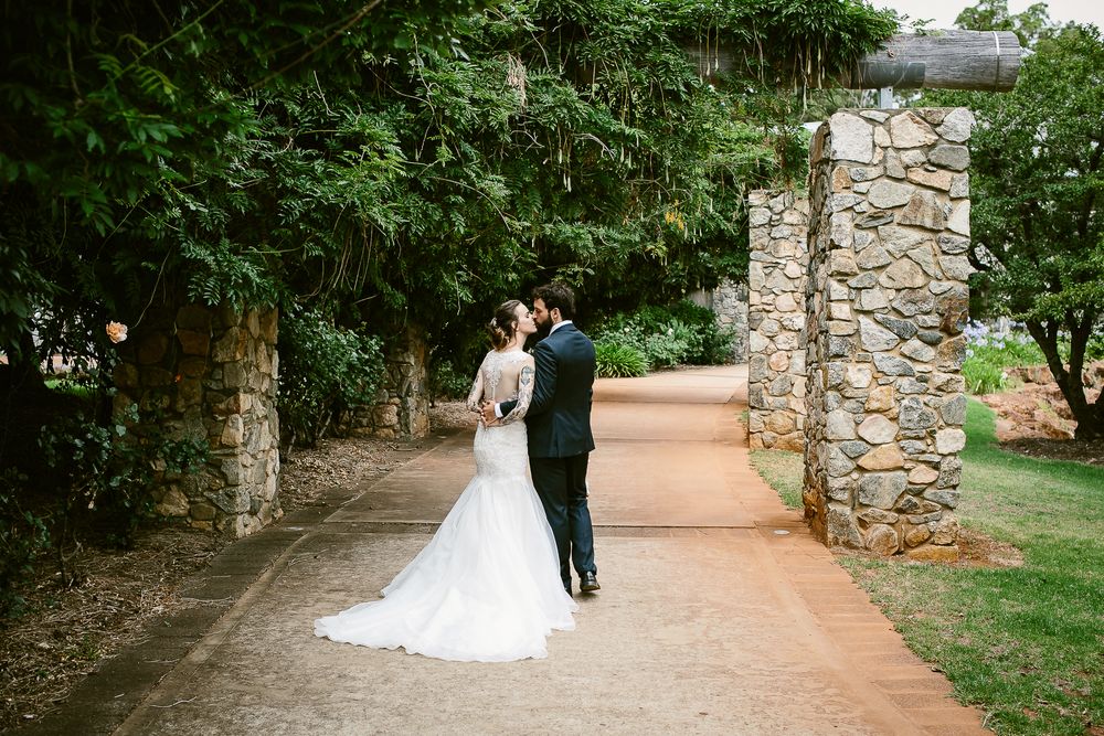 Bride and groom kissing at Millbrook Winery wedding
