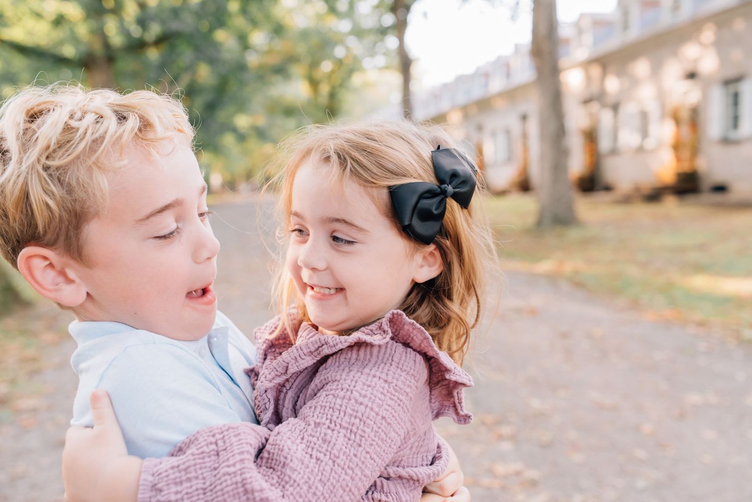A Brother and sister hug.