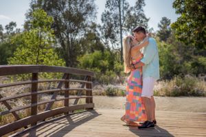 Rachel Aranico Photography, Couples, Man and wife kissing on bridge