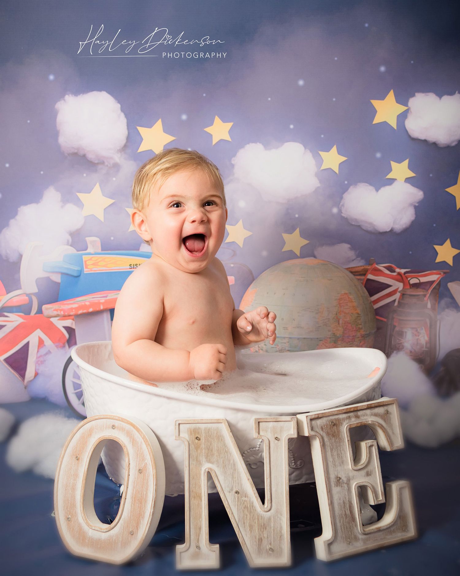 Hayley Dickenson Photography Studio - baby boy having a cake smash photo taken