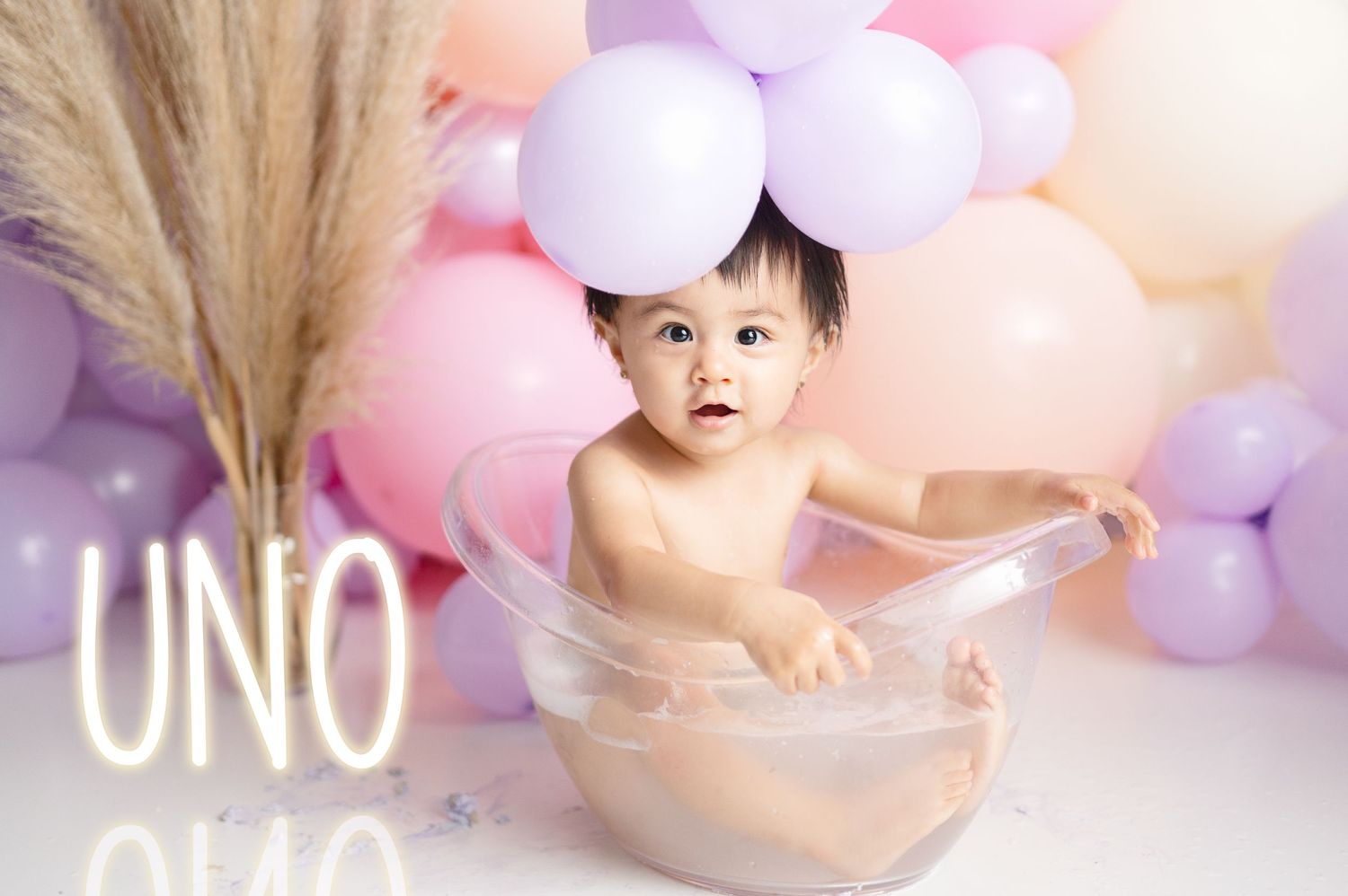 Birthday celebration scene with pink and purple balloons creating dreamy atmosphere.