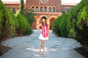 College grad posing with cap at Cal State Chico