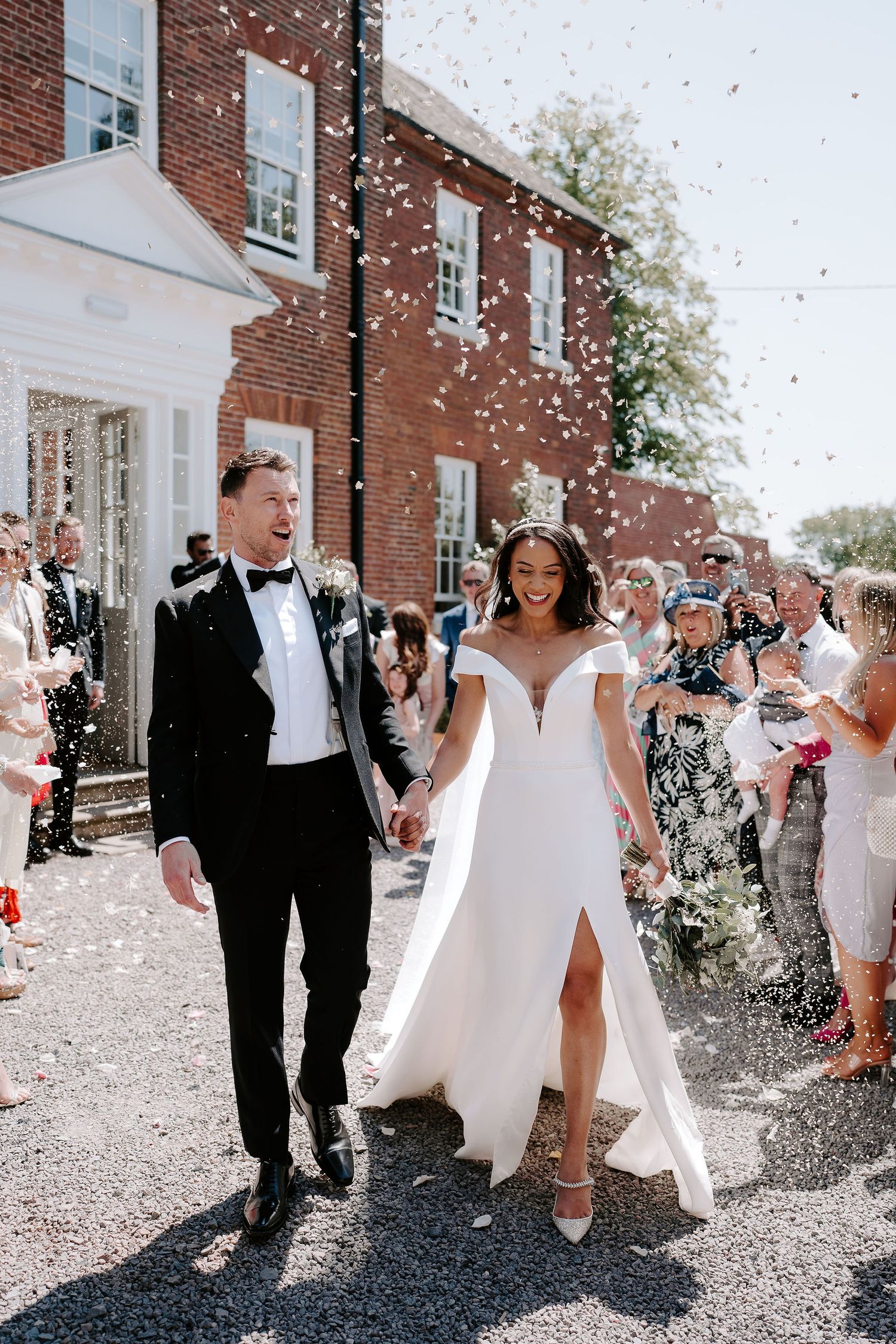 bride-and-groom-confetti-stockton-house-wedding-shropshire