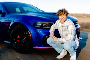 Blue sports car photographed from multiple angles in outdoor setting.