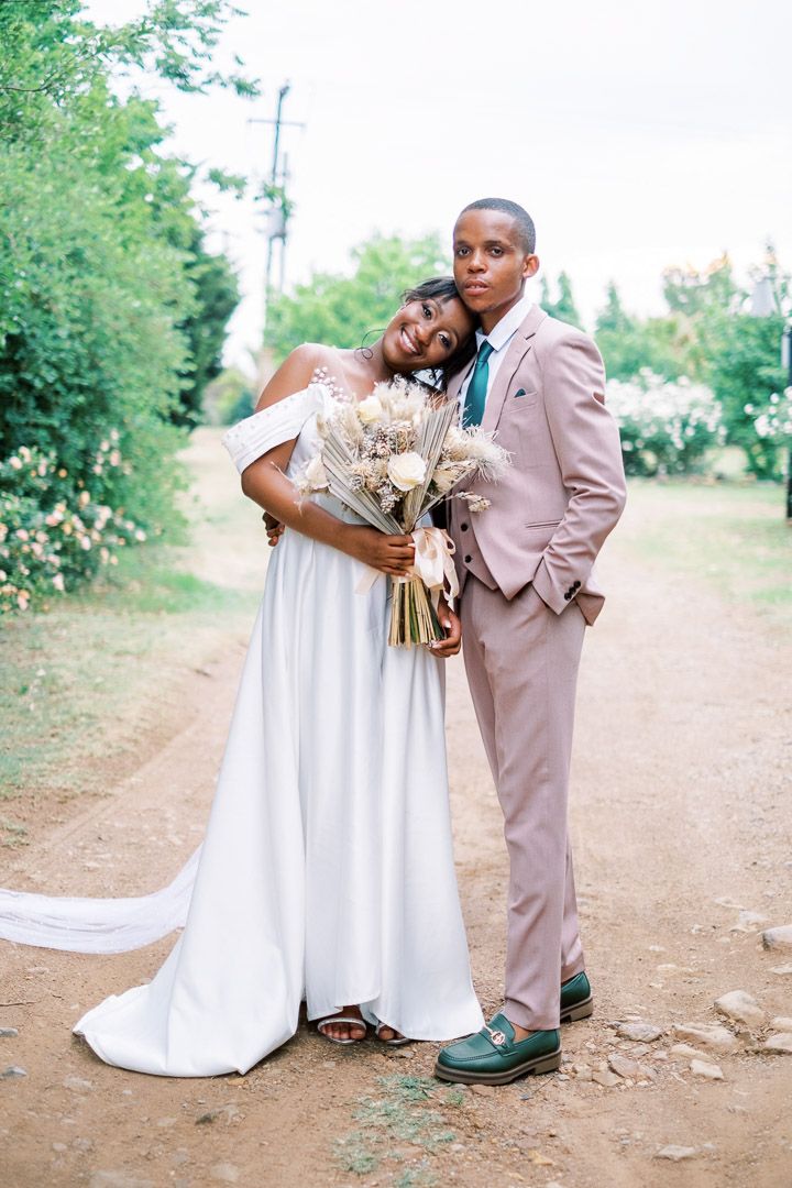 Wife poses with husband