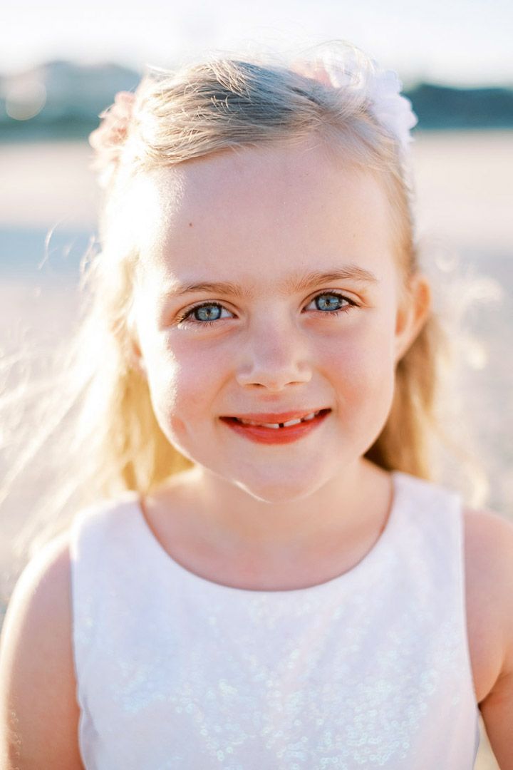 Girl in sunset light on the beach