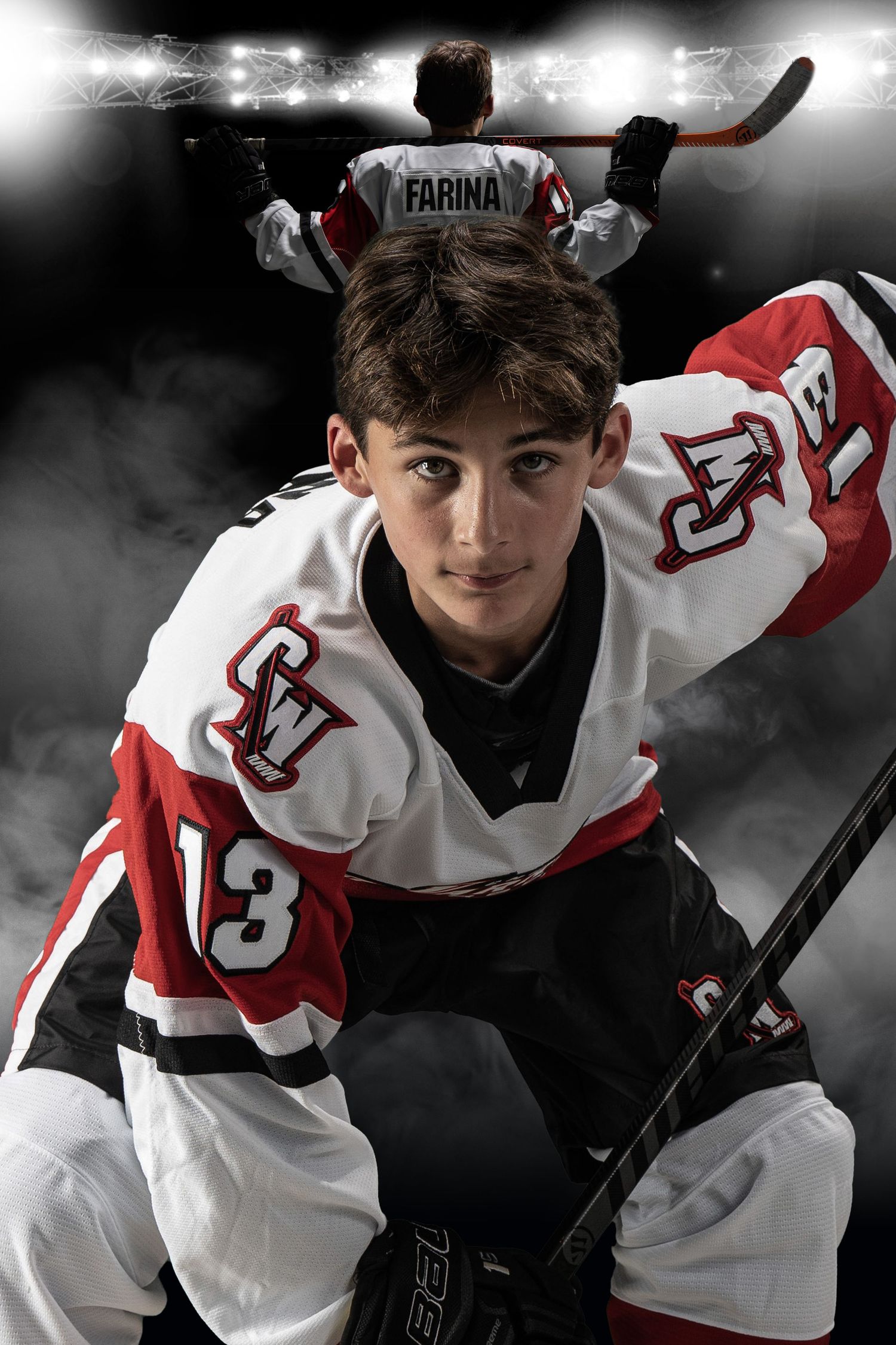 Hockey player in white and red jersey captured in dynamic action pose.