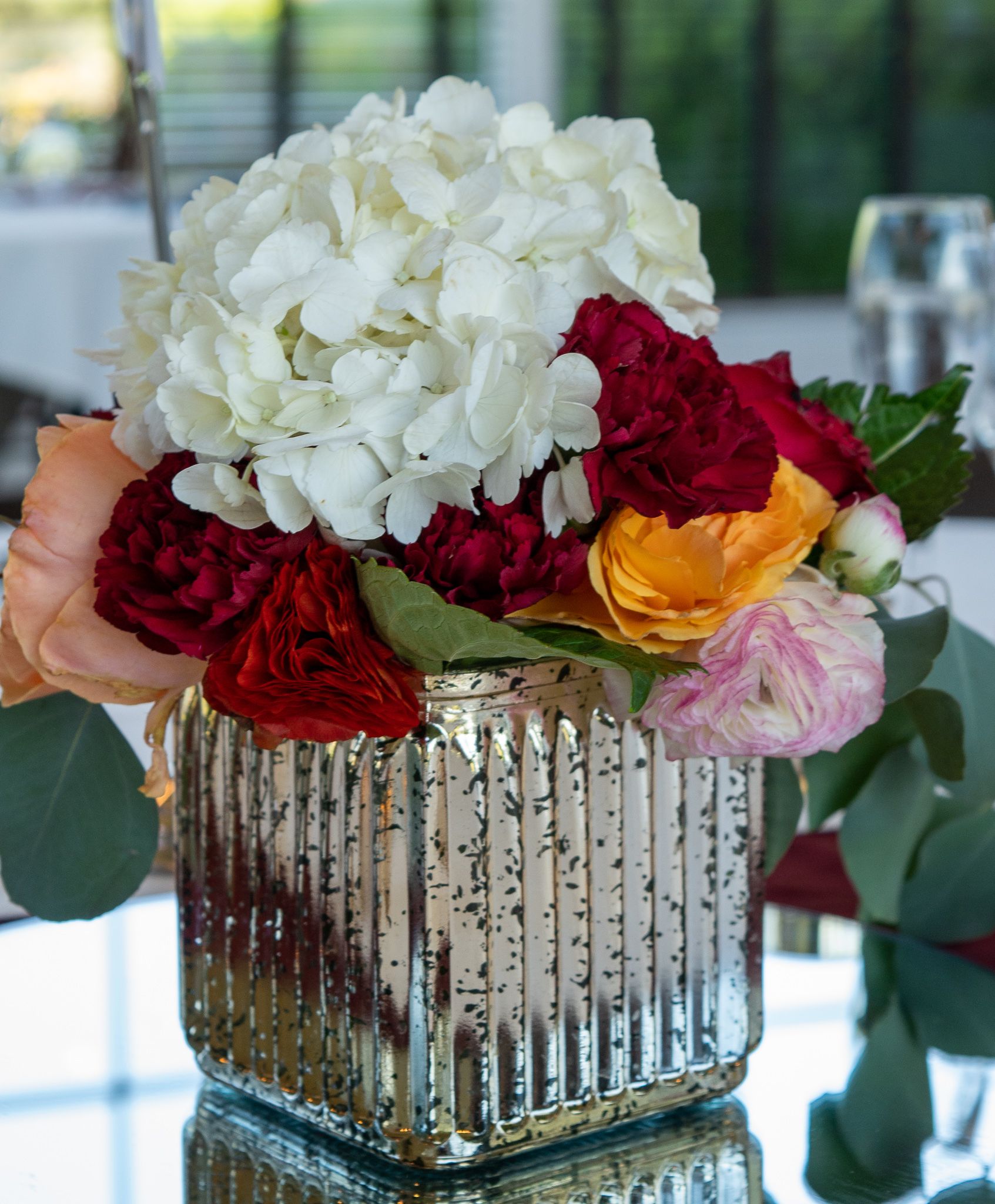 Hydrangeas, Roses, Carnations, Eucalyptus, mirrored glass, centerpiece, formal wedding