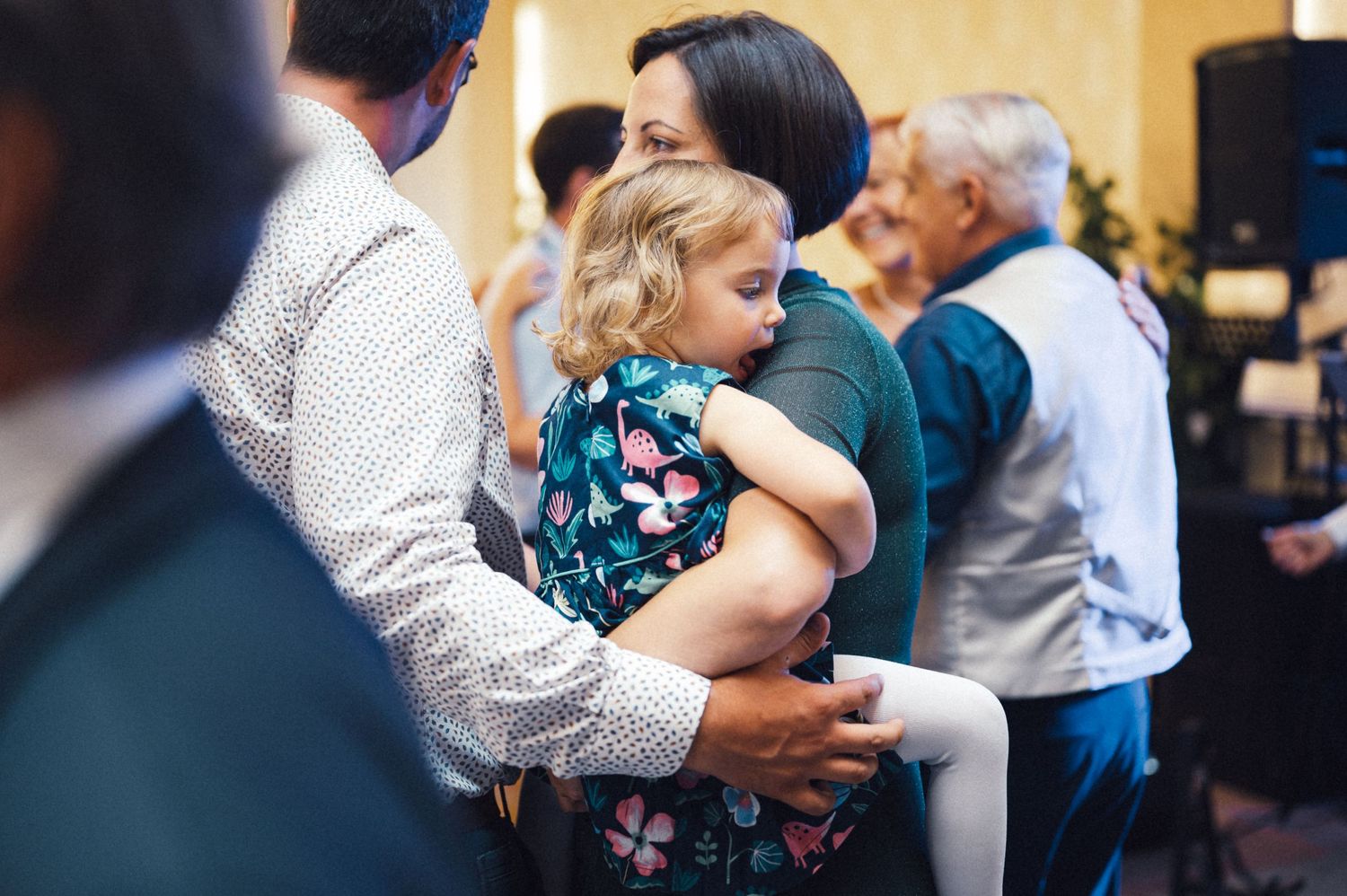 A tender slow dance moment captured during a celebration event.