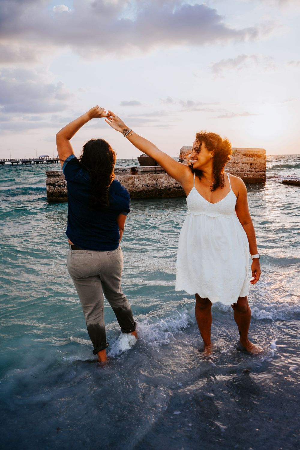 Outdoor Engagement Session at Ft. Desoto in St. Pete, FL; LGBTGIA session, same-sex couple dancing on beach