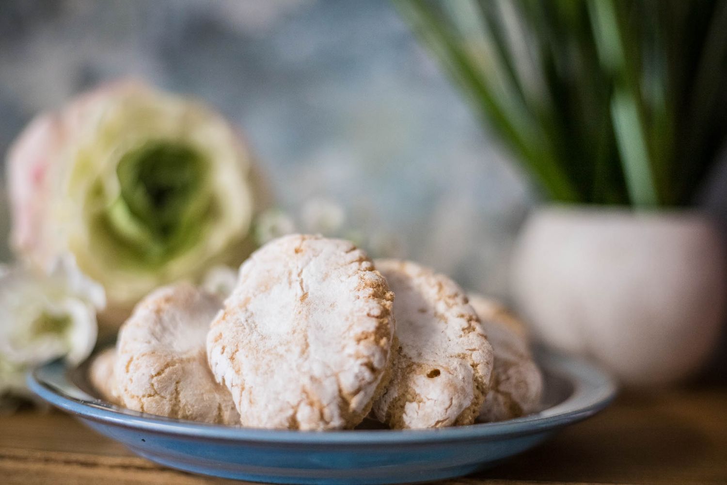 Image of homemade cookies on a plate with pretty florals in the background