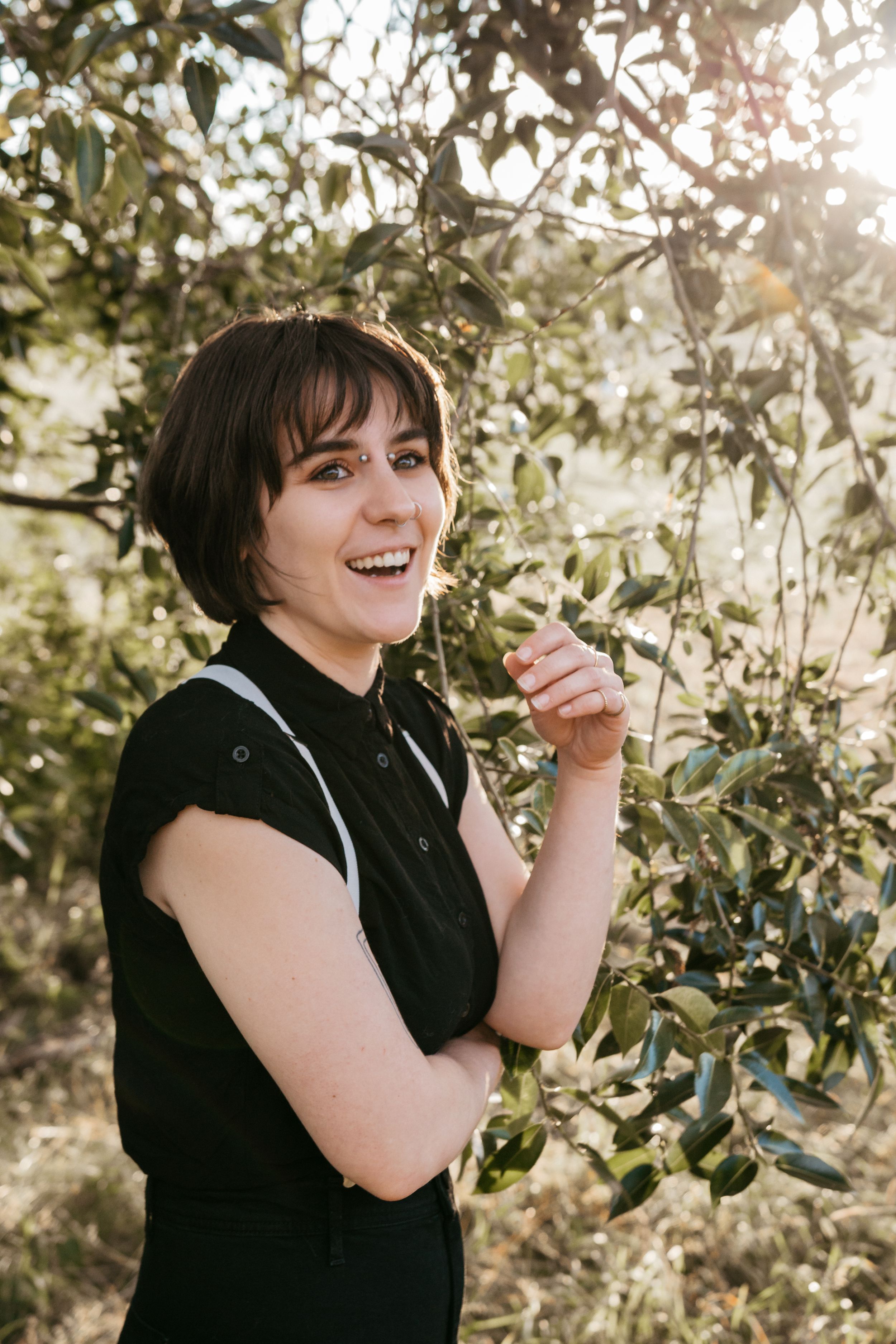 Candid Portrait Photo in summer trees