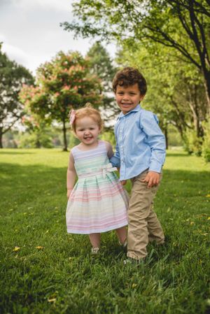 Toddler brother and sister at Denver city park for portraits